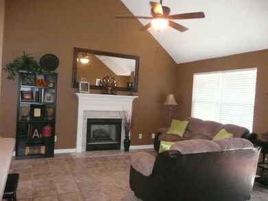 LIVING ROOM WITH FIREPLACE WITH GAS LOGS,VAULTED CEILING