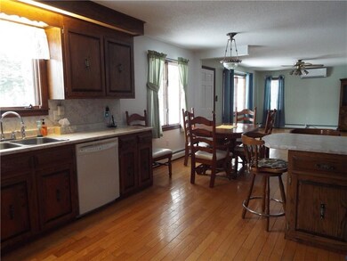 spacious kitchen open to dining and...