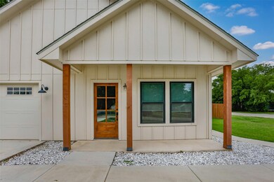 Property entrance featuring a garage