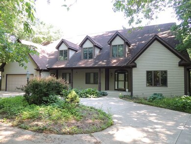 Circular driveway leads to this amazing home.
