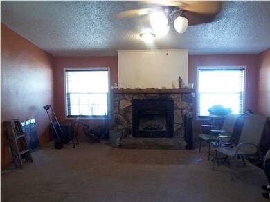 Living room with rock fireplace