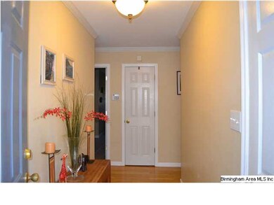 View from front door through foyer - door on right