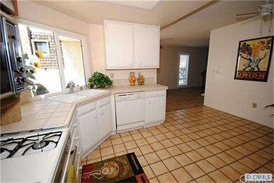 Kitchen is always light and bright and looks out t