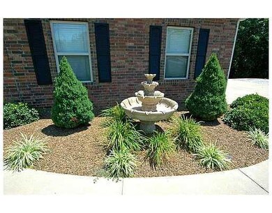 Exterior Front. Professionally Landscaped