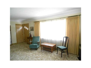 Front Exterior. Large, bright living room!