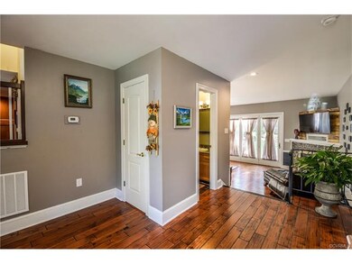 Lovely entrance Foyer with powder room.  Notice th
