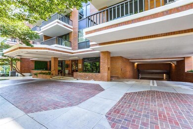 Front entrance to building, circular drive and gat