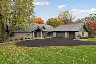 Three car garage and newly seal-coated driveway