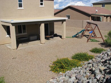Spacious back yard with covered patio