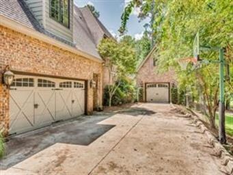 A triple car garage. The detached single car garag
