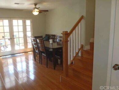 Attractive and casy care flooring.  French doors h