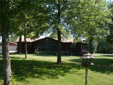 Perfectly manicured acreage with the perfect amoun