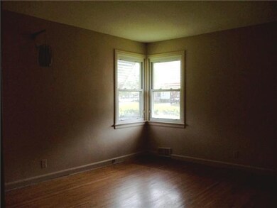 Bedroom. Bedroom with hardwood floors and corner w