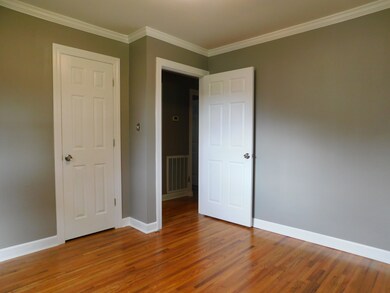 Bedroom 3 has hardwood floors.