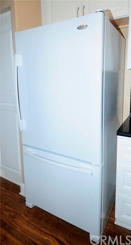 Large fridge in the kitchen.