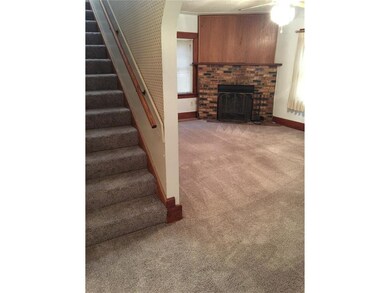 Foyer to living room, new carpeting installed in '