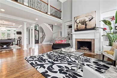 Living Room into Foyer and Dining Room/Billiards A