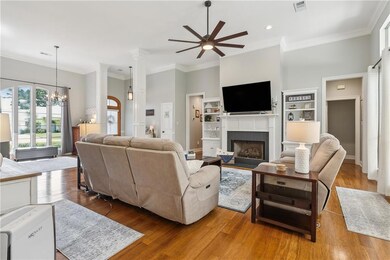 Cozy gas fireplace with bookcases