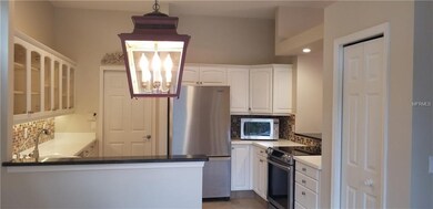 Kitchen has loads of storage and a roomy eat-in ar