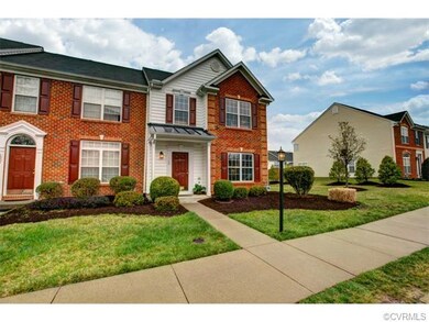 End unit surrounded by professionally manicured gr