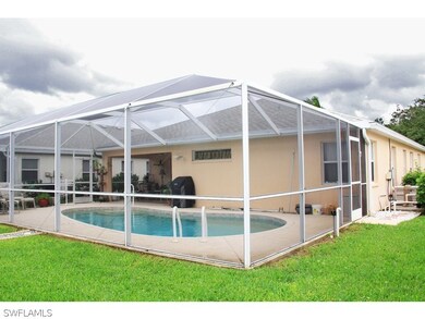 Below Ground Pool with Screened Enclosure