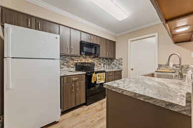 Galley kitchen with the laundry room door