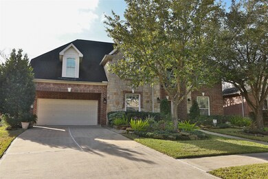 HUGE 4-CAR GARAGE with upgraded expoxy floors! Plenty of room for multiple vehicles or work station!