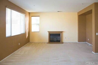 The Living Room with Fireplace.