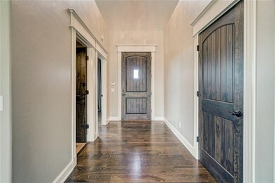 Foyer.  Beautiful hard wood floors and solid doors