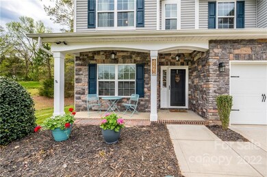 Relax on the extended front porch.