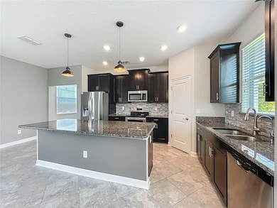 10182 Authors Way, Orlando, FL 32832 - photo 3