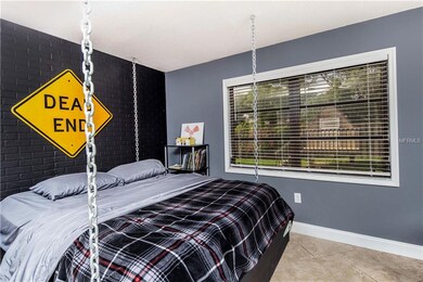 A third bedroom overlooks a fort/playhouse in the 