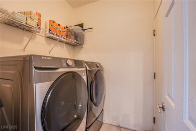 Laundry area featuring washing machine and dryer,