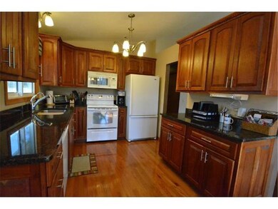A true cook's kitchen with custom cherry cabinets 