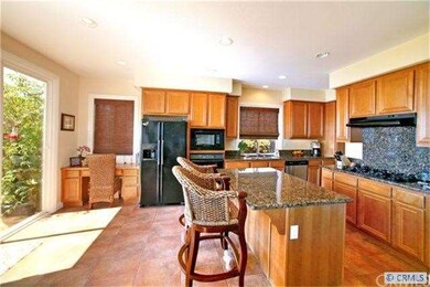 Open Kitchen from Living Room with Back Yard & Oce