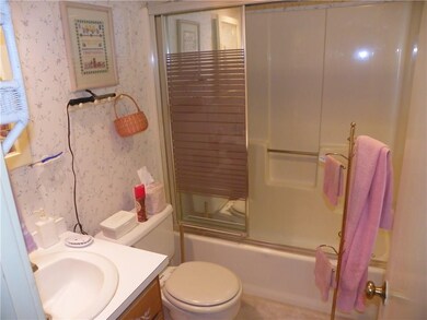 Full bathroom with tub/shower off the living room.