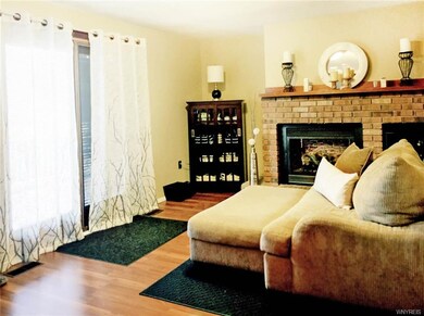 Family room with gas fireplace (remote) and wine c