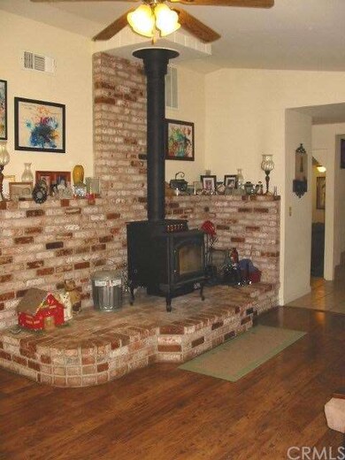 Woodstove on used brick hearth