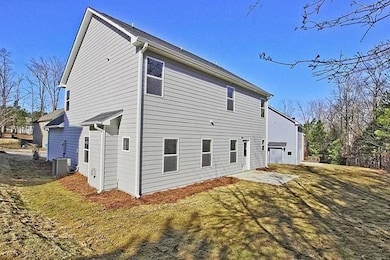 Back of house featuring a patio area
