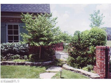 Exterior Front. Front Courtyard