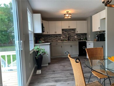 Remodeled Kitchen granite countertops, glass backsplash