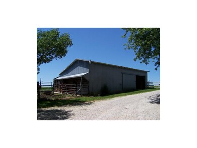 27 x 40 barn with 4 stalls and a wash rack.
