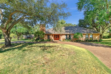 Enjoy the convenience of the circle-drive, side entry garage and turn-around area,