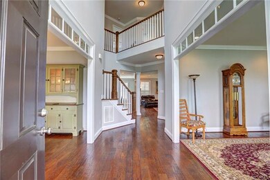 Palatial, soaring entry with dramatic overlook--th