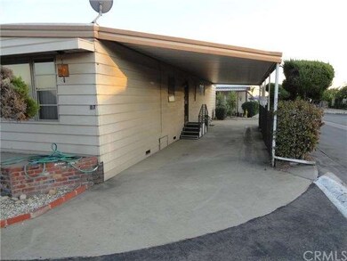 Carport showing back door entry and pull through c