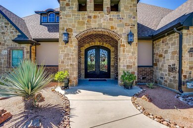 Front exterior entry area showing very detailed, easy, low maintenance landscaping.