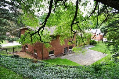 Patio And Home Through The Trees