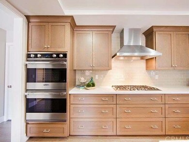 Double Viking Oven and 6 Burner Cooktop with Hood