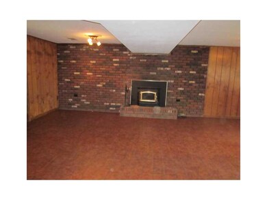 Family Room. level entry family room w/ insert in 