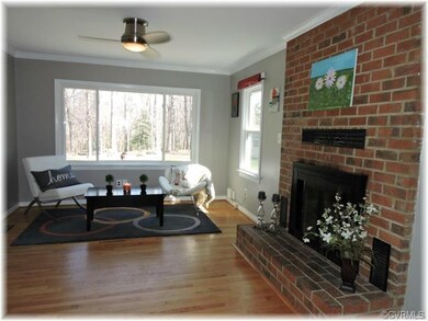 FAMILY ROOM - Huge picture window overlooking gorg